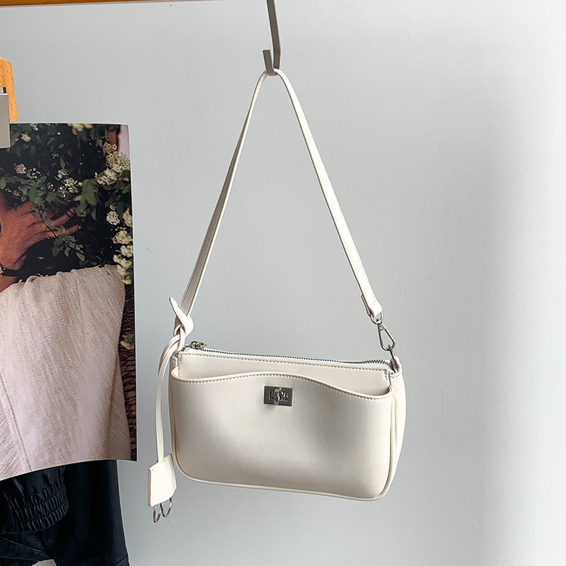 2025 Spring And Summer New Simple Literary Niche Leisure Shoulder Bag Korean Version Of Solid Color Everything Stylish Locking Handbag Designer Bag