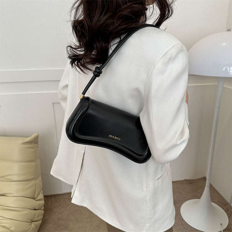Advanced armpit artistic style shoulder niche irregular small square bag, gentle and simple hand-held bag