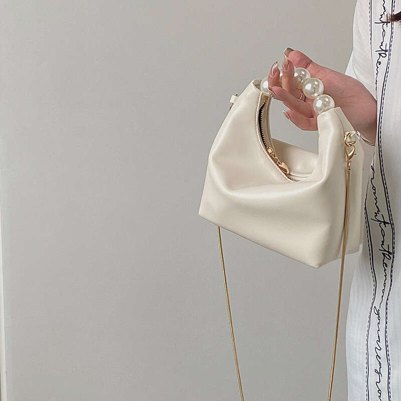 Small high-end pearl handbag, women's 2025 new mini chain shoulder crossbody small bag, dumpling bag