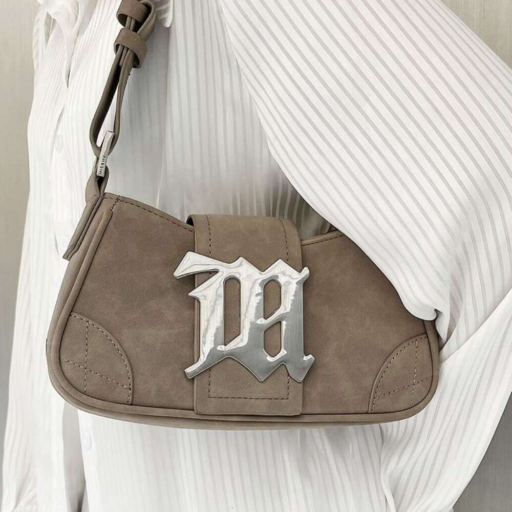 47 2025 autumn and winter new niche design women's suede leather single shoulder handbag 2K millennium spicy girl armpit bag