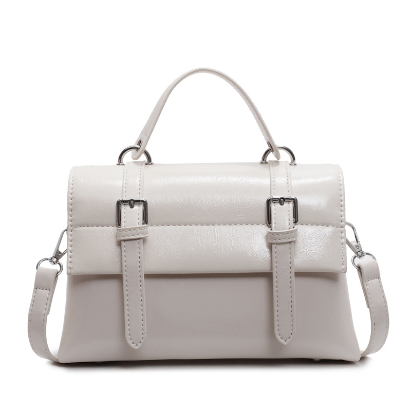 free shipping College wind large capacity handbag female early spring new solid color shoulder bag texture