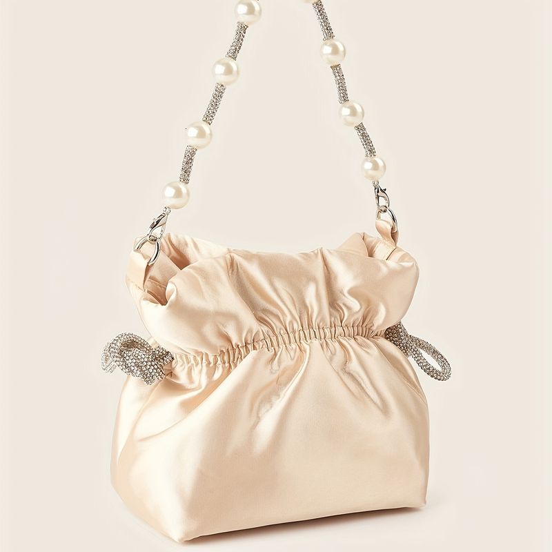 Elegant Solid Color Clutch With Rhie Accents And Pearl Handle