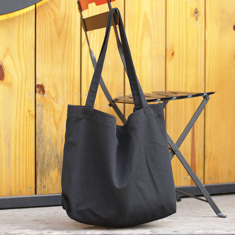 Korean version simple and large capacity canvas net red, lightweight solid color single shoulder women's casual shopping bag, handbag