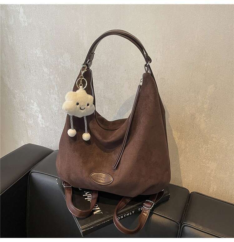42 Fashionable pleated women's autumn and winter new style large capacity bag 2024 texture double shoulder suede trendy pendant