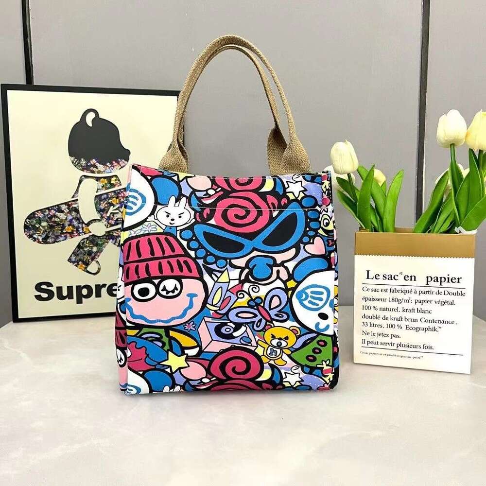 2024 new cute and stylish canvas with large capacity office use, lunch box bag for moms to go out, fashionable handbag