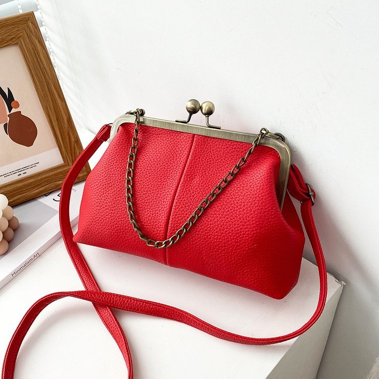 Free shipping Europe and the United States retro shell bag new lychee pattern simple 100 shoulder bag clip chain handbag women's bag