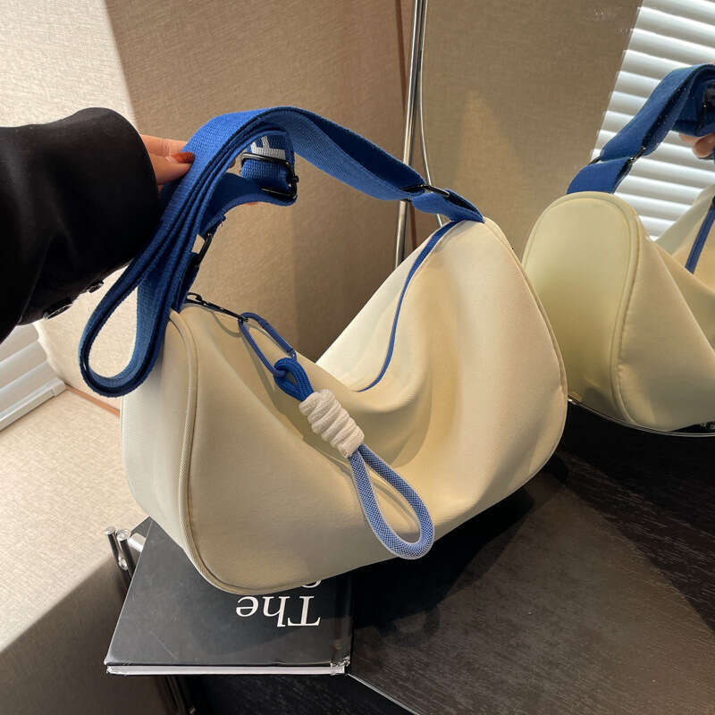 2d Waterproof Oxford cloth large capacity dumpling with crossbody for female niche new versatile casual sports style shoulder bag trend