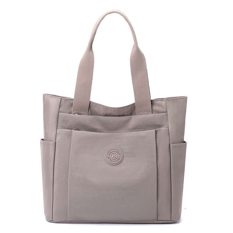 d1 Casual women's handbag style 2024 summer new large capacity casual solid color nylon cloth single shoulder hand-held mother bag