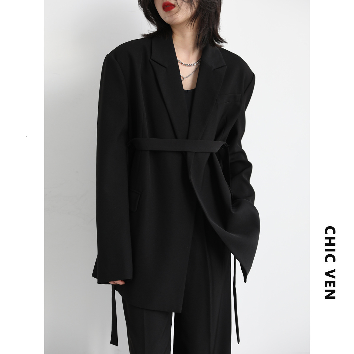 2025 high-end design sense niche wide shoulder ribbon mid length drape white jacket women's black spring and autumn suit