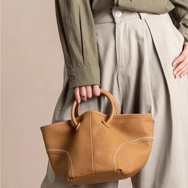 Designer 2025S autumn soft leather casual versatile hand-held vegetable basket lazy style shoulder crossbody women bag