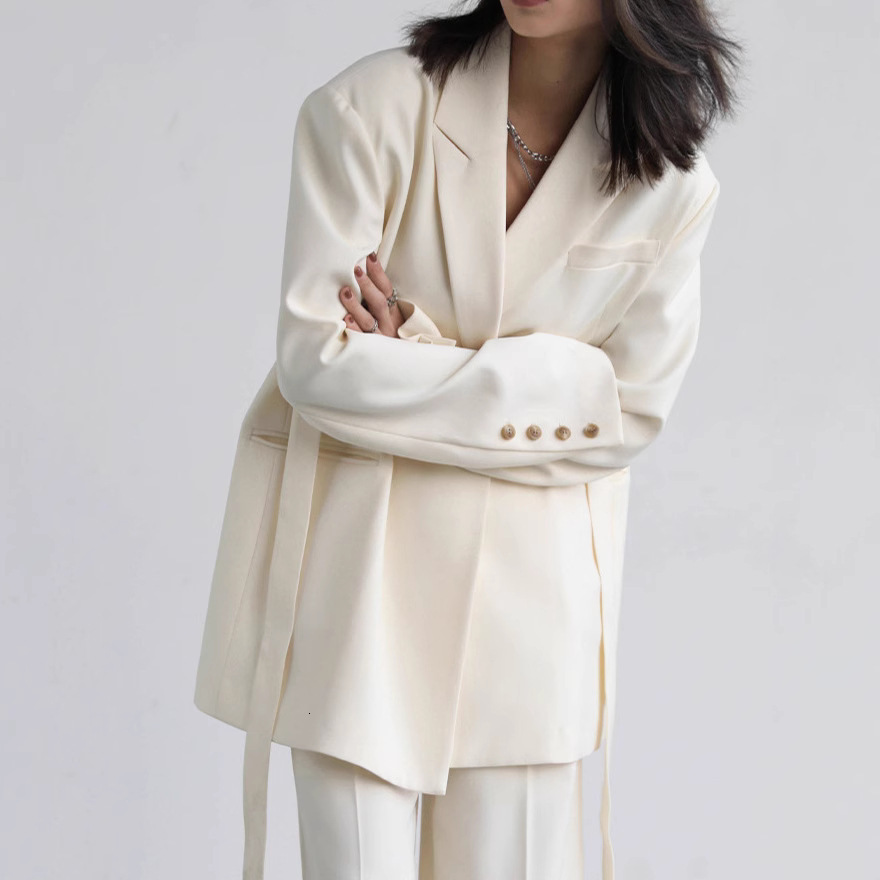 2025 high-end design sense niche wide shoulder ribbon mid length drape white jacket women's black spring and autumn suit