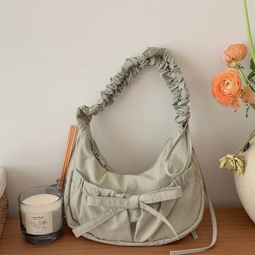 Young Girl Ins Casual Personality Korean Version Of Simple Fold Bow Temperament All-in-one Shoulder Armpit Crossbody Bag for Women