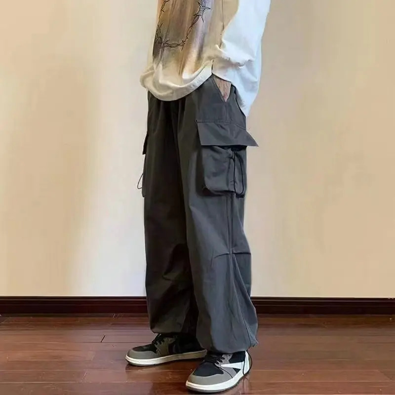 Streetwear Spring Harem Casual Pants Mens Elastic Waist Solid Color Product Pants Multi Pocket Loose Womens Bag Pants 250324