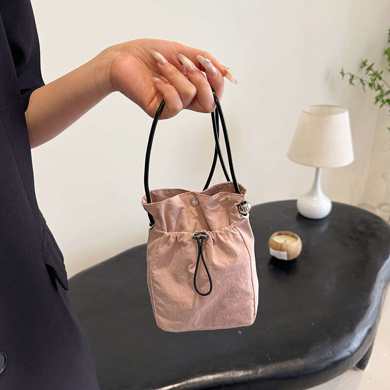 Minimalist style mobile phone bag for women, Japan and South Korea, lightweight drawstring canvas small bag, versatile mini one shoulder crossbody zer