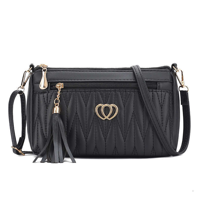 Mom's middle-aged high-end small mini crossbody bag, women's niche tassel soft leather mailman's bag