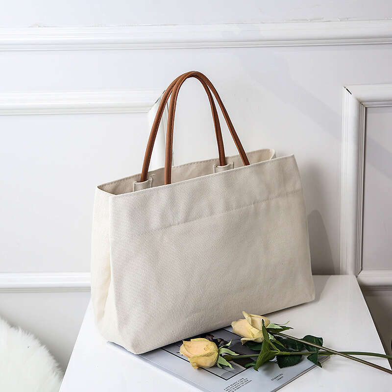 2024 New South Korean Large Capacity Canvas Instagram Style Small and Popular Design Handheld Shoulder Tote Shopping Bag