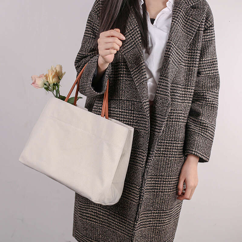 2024 New South Korean Large Capacity Canvas Instagram Style Small and Popular Design Handheld Shoulder Tote Shopping Bag
