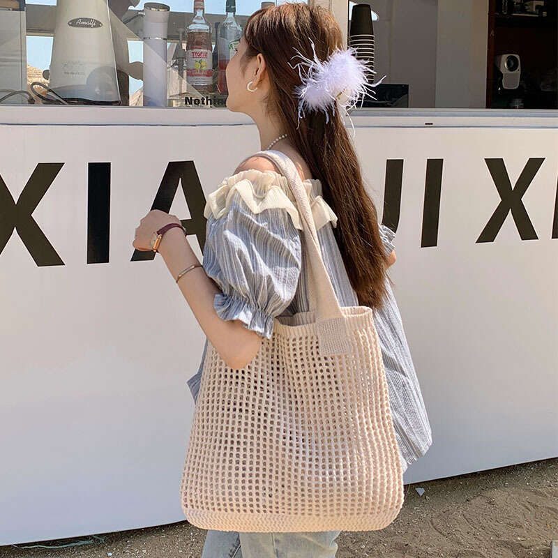 Summer niche versatile knitted simple woven mesh hollowed out women's shoulder bag, tote handbag
