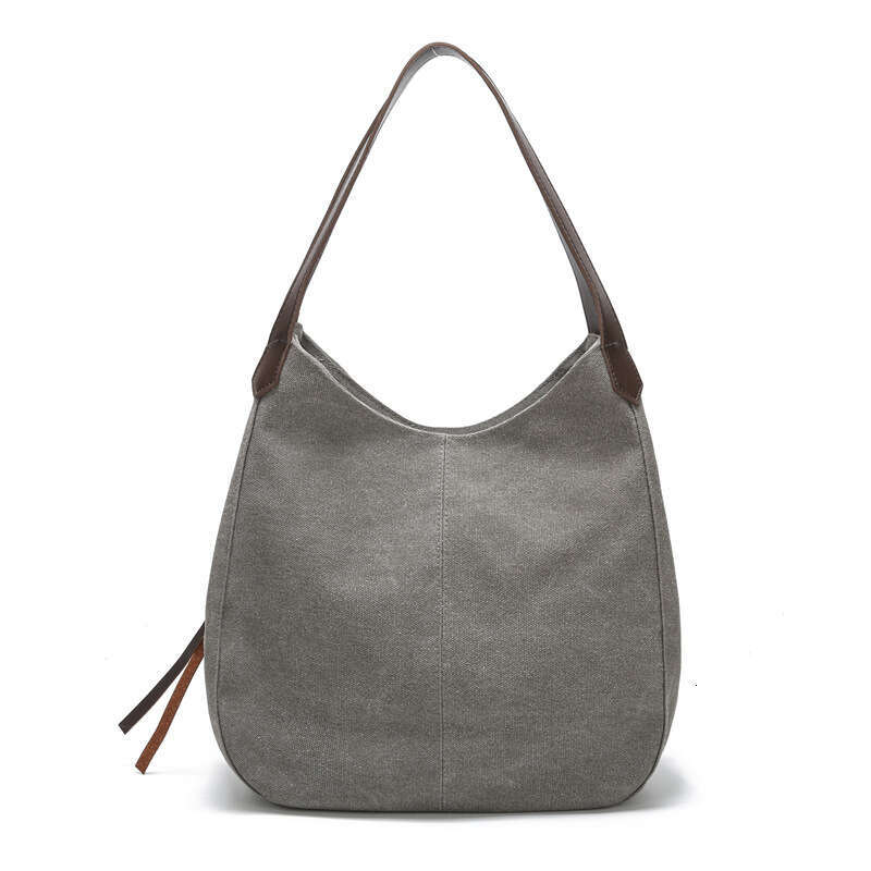 2025 new canvas women's bag, fashionable versatile, artistic and simple Korean version, single shoulder handbag, multiple compartments, casual la