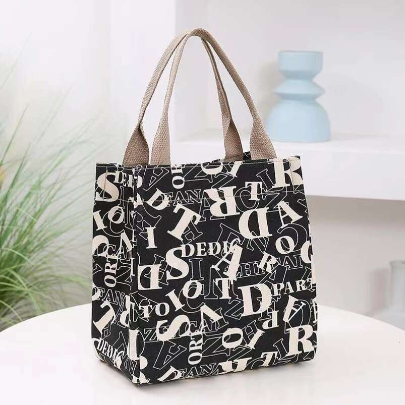 2024 new cute and stylish canvas with large capacity office use, lunch box bag for moms to go out, fashionable handbag