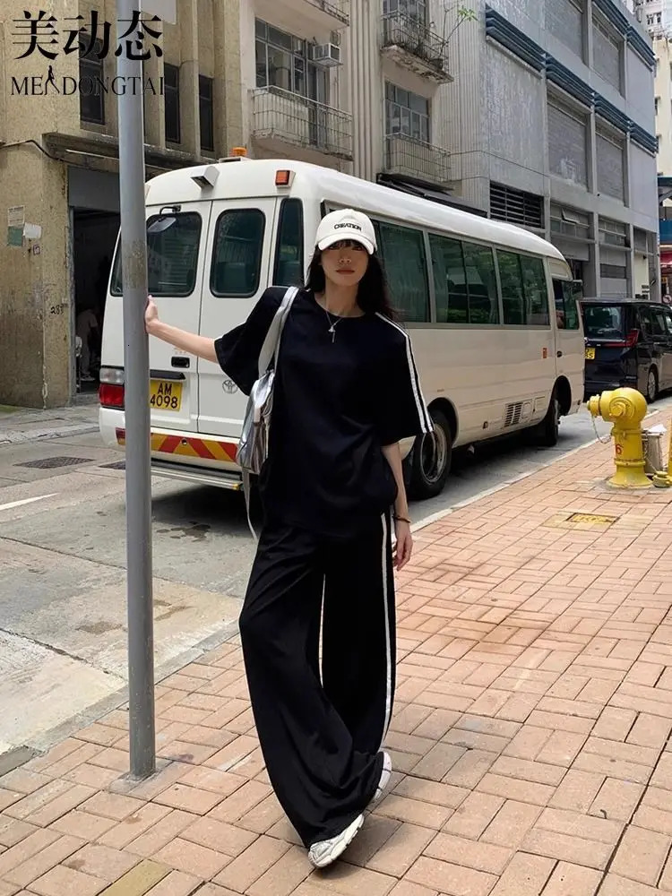 Spring and summer loose casual suit womens striped short sleeved T-shirt wearing floor sweeping wide leg pants two-piece set 250320