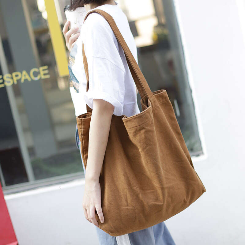 Korean version simple and large capacity canvas net red, lightweight solid color single shoulder women's casual shopping bag, handbag