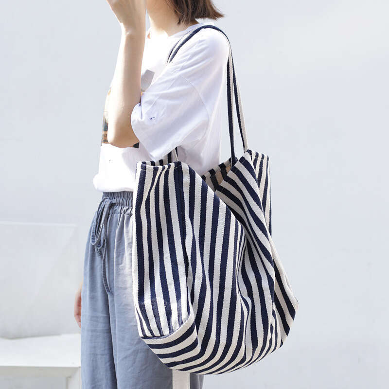 d2 Korean version of artistic handbag, simple fresh striped canvas bag, casual and fashionable, large capacity single shoulder women's bag