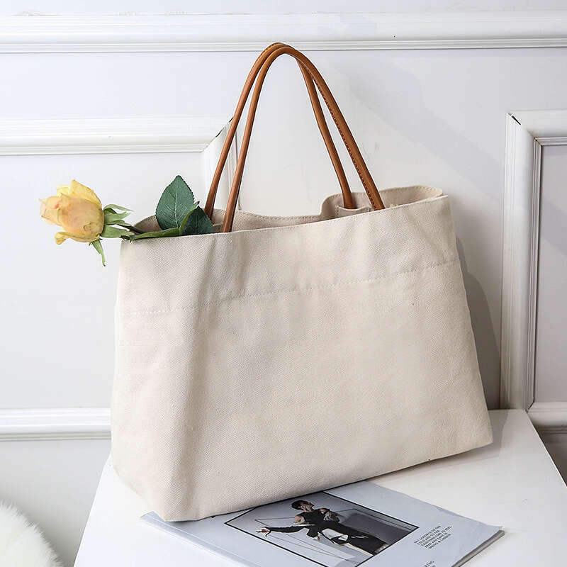 2024 New South Korean Large Capacity Canvas Instagram Style Small and Popular Design Handheld Shoulder Tote Shopping Bag