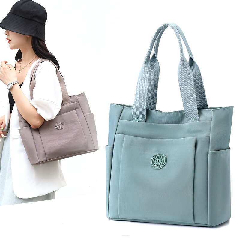 d1 Casual women's handbag style 2024 summer new large capacity casual solid color nylon cloth single shoulder hand-held mother bag