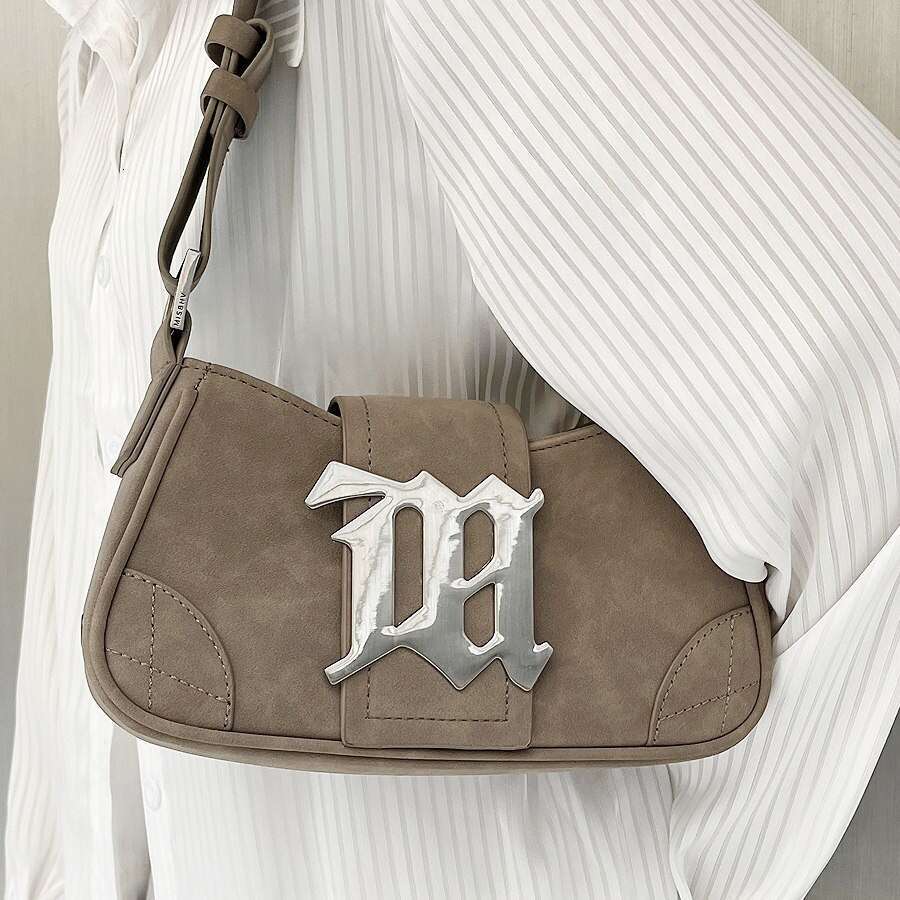 47 2025 autumn and winter new niche design women's suede leather single shoulder handbag 2K millennium spicy girl armpit bag