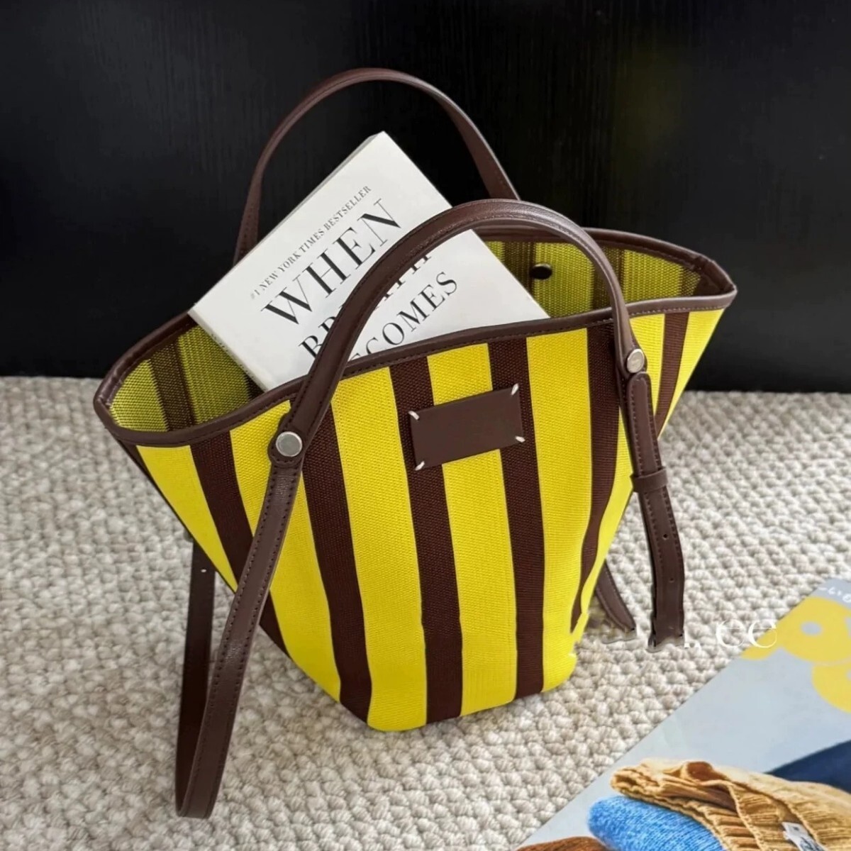 2025S Fashion Designer Handheld Striped Vegetable Basket For Women S New Early Spring Commuting Woven Fabric Single Shoulder Bucket Bag