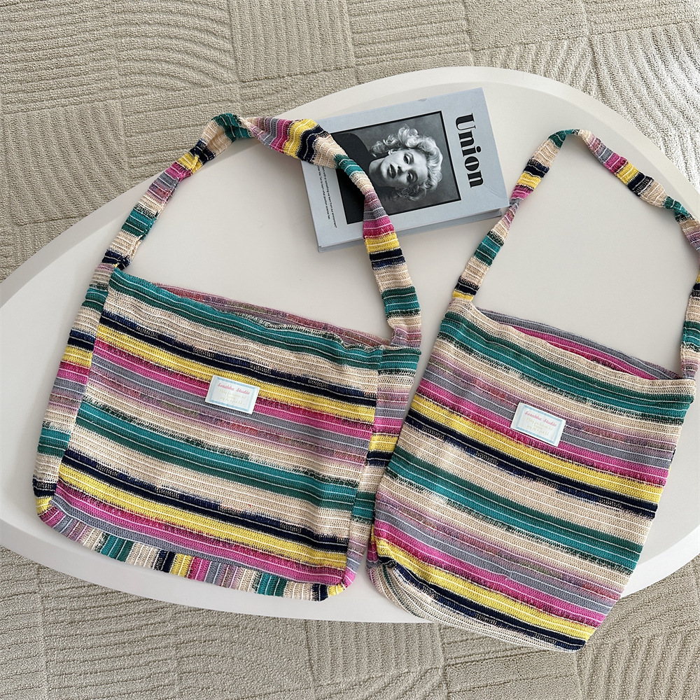 Wool knit handbag women's new color rainbow stripes armpit shoulder braided bag 2025