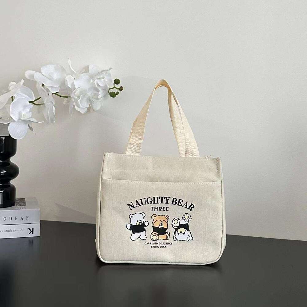 High aesthetic canvas handbag moms to go out, simple and compact, three-dimensional carrying commuting, thick for work, lunch box, rice bag