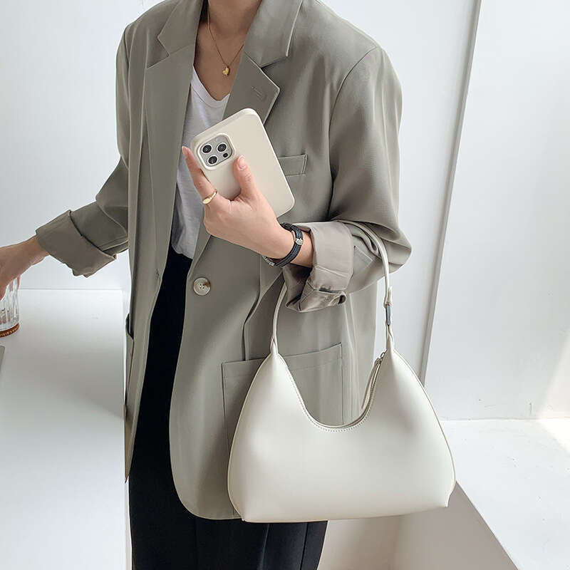Korean niche portable fashion shoulder women, high-end PU shaped underarm bag for women