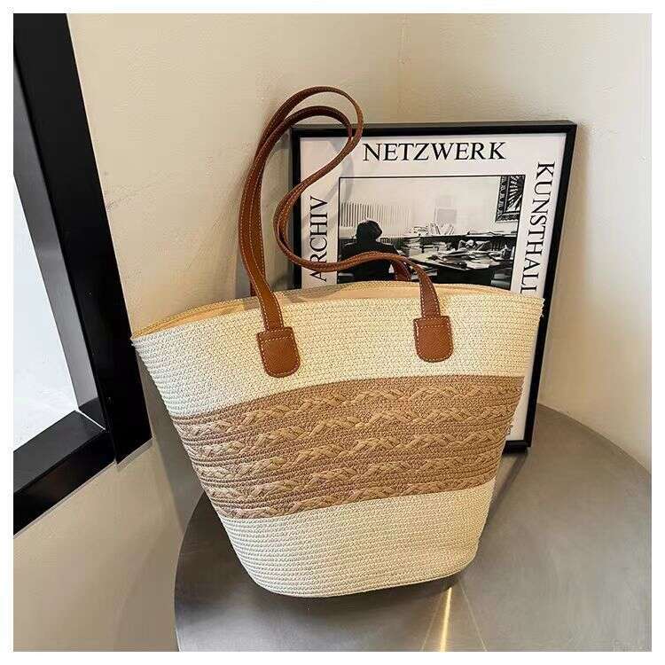 ca Women's ins new simple and fashionable grass woven large capacity armpit single shoulder hollow weave beach bag for women
