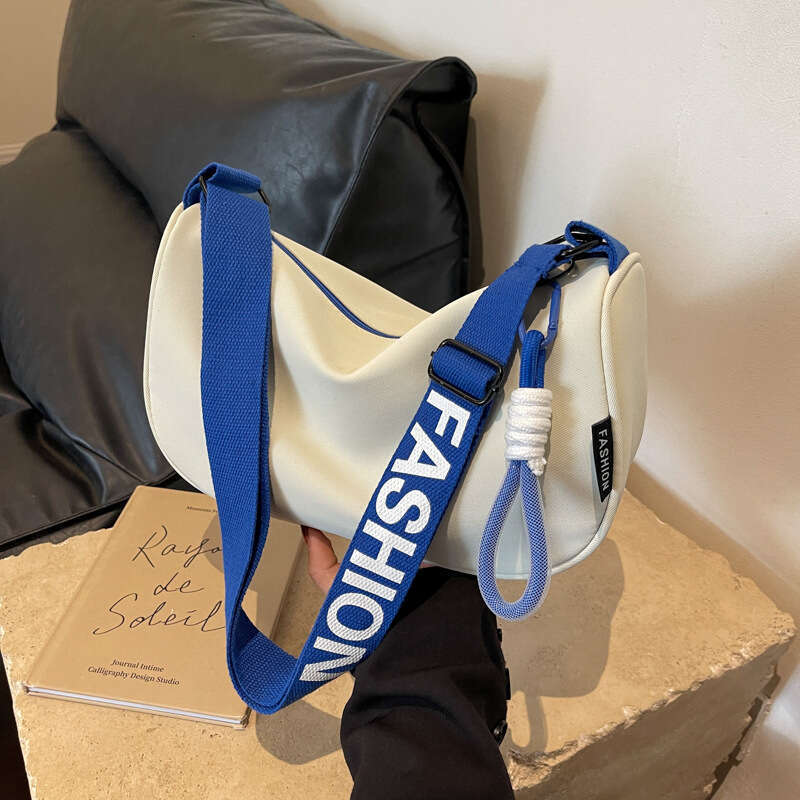 2d Waterproof Oxford cloth large capacity dumpling with crossbody for female niche new versatile casual sports style shoulder bag trend
