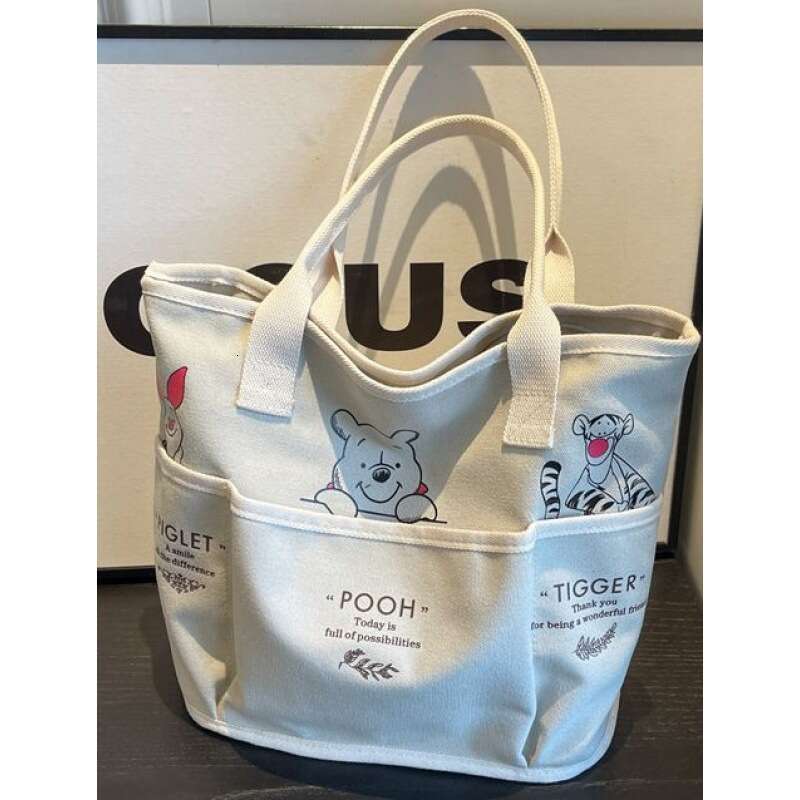 Spring and summer tote women, large capacity canvas female students, book carrying for class, commuting shoulder bag