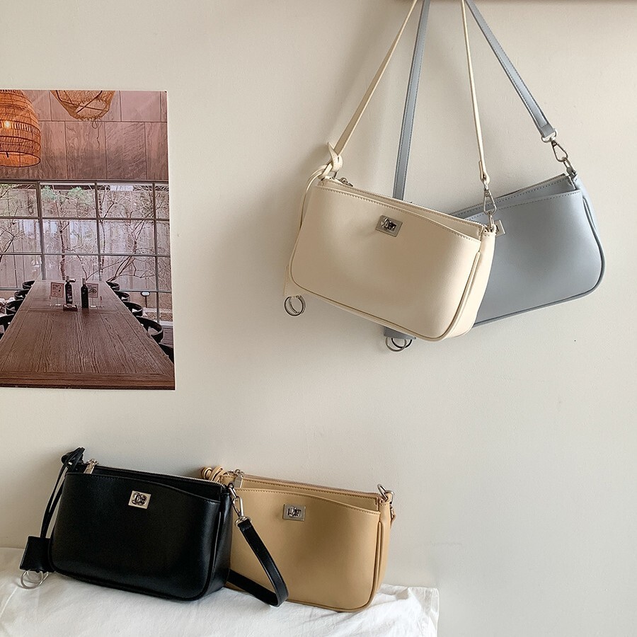 2025 Spring And Summer New Simple Literary Niche Leisure Shoulder Bag Korean Version Of Solid Color Everything Stylish Locking Handbag Designer Bag