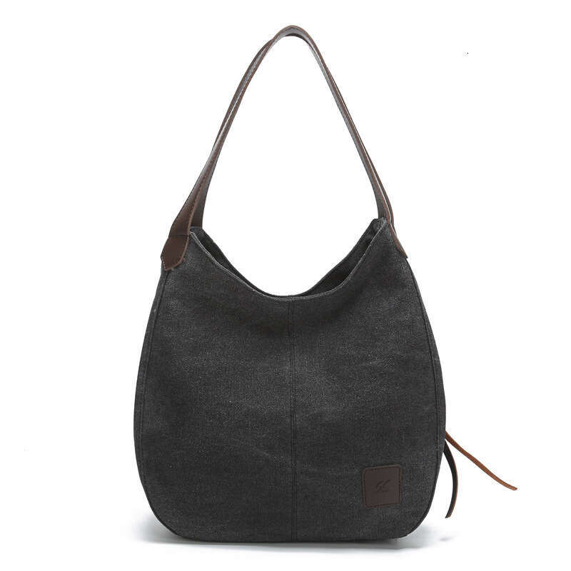 2025 new canvas women's bag, fashionable versatile, artistic and simple Korean version, single shoulder handbag, multiple compartments, casual la