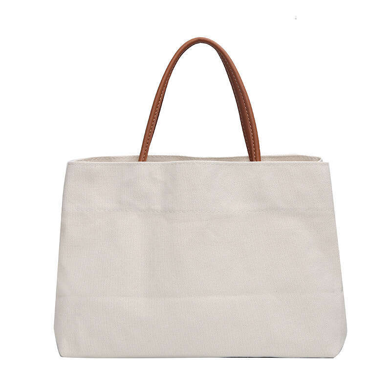 2024 New South Korean Large Capacity Canvas Instagram Style Small and Popular Design Handheld Shoulder Tote Shopping Bag