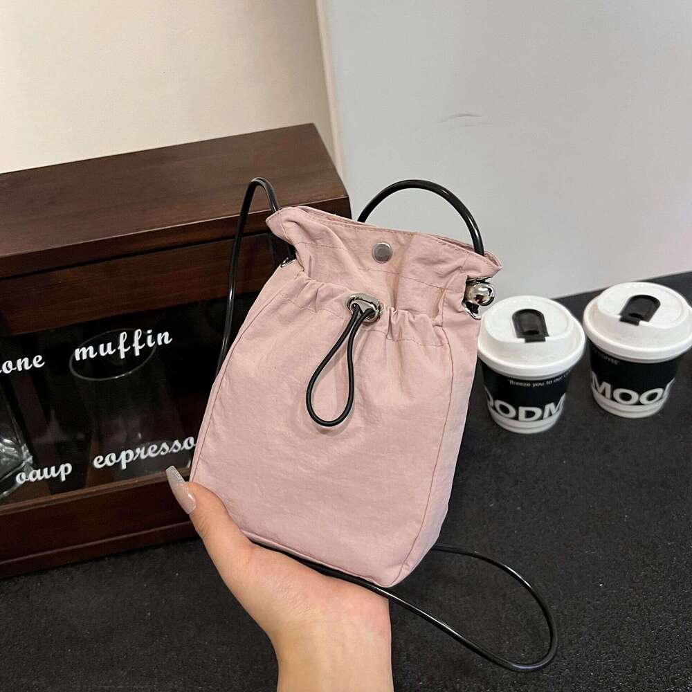 Minimalist style mobile phone bag for women, Japan and South Korea, lightweight drawstring canvas small bag, versatile mini one shoulder crossbody zer