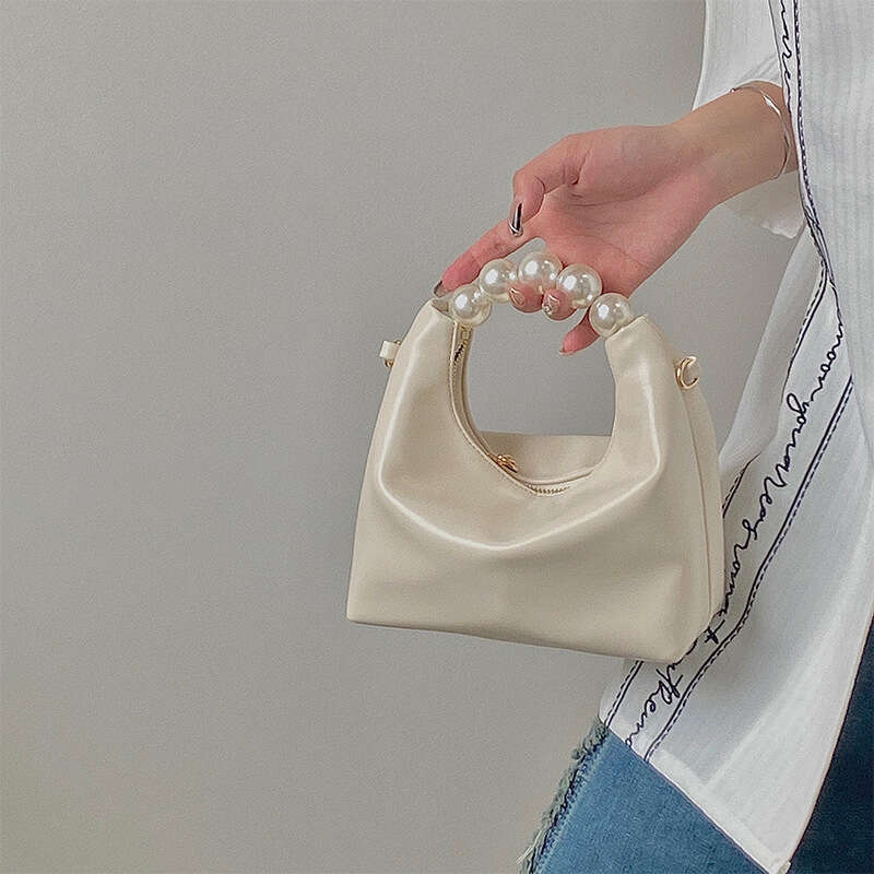 Small high-end pearl handbag, women's 2025 new mini chain shoulder crossbody small bag, dumpling bag