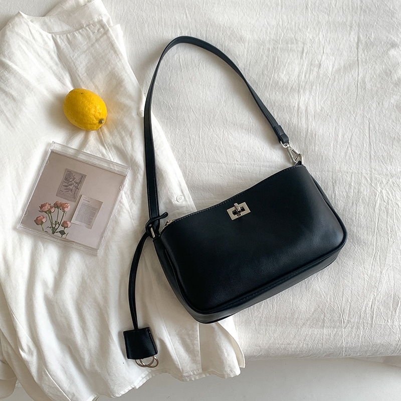 2025 Spring And Summer New Simple Literary Niche Leisure Shoulder Bag Korean Version Of Solid Color Everything Stylish Locking Handbag Designer Bag