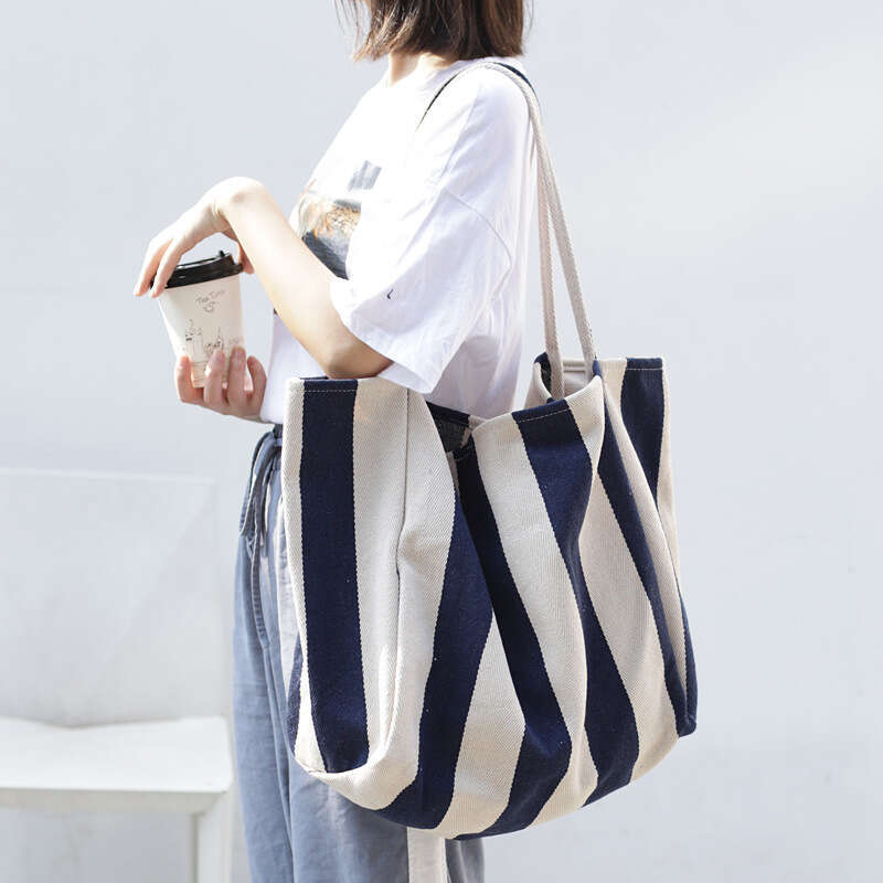 d2 Korean version of artistic handbag, simple fresh striped canvas bag, casual and fashionable, large capacity single shoulder women's bag