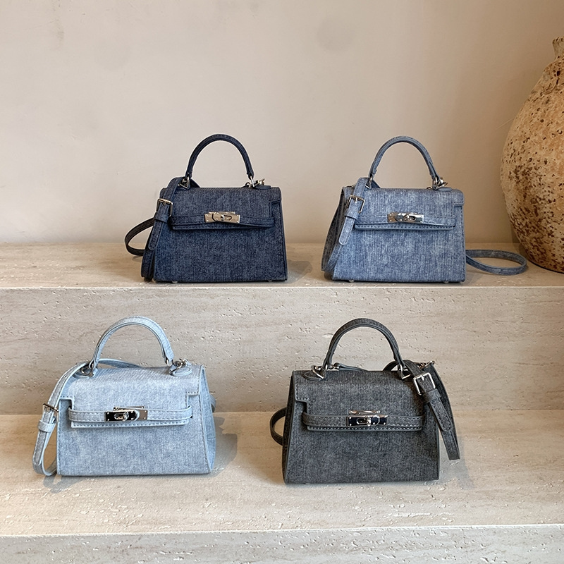 Free shipping 2025 new designer bag, fashionable and casual denim pattern, solid color handheld shoulder bag, women's daily outfit