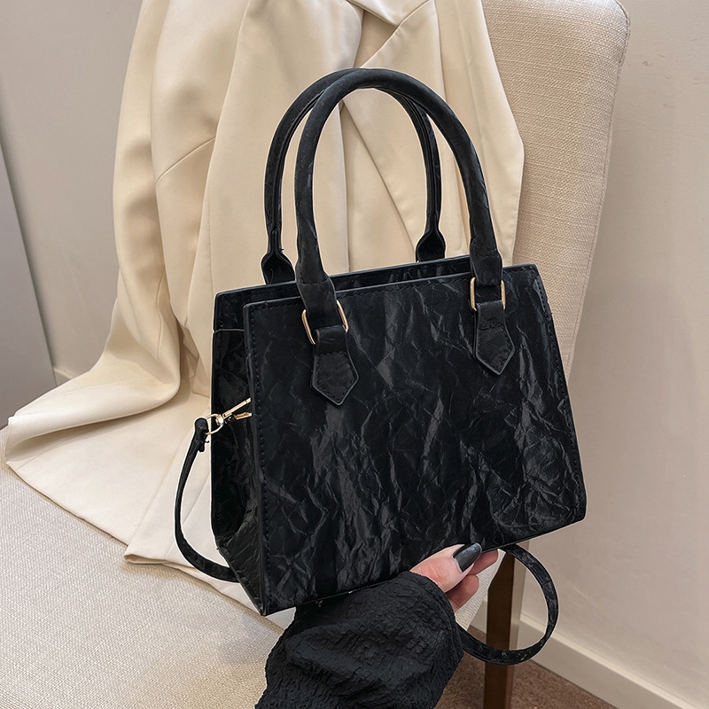 Free shipping Fashion niche design folding hand bag small square retro fashion texture single shoulder crossbody bag