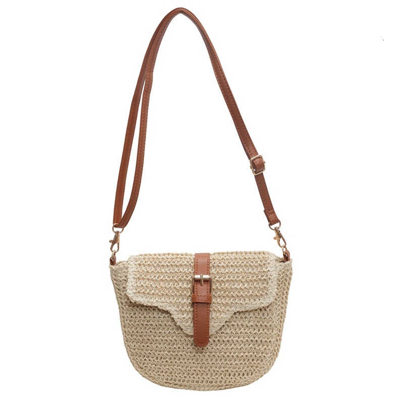 Designer 2025S daily casual versatile woven saddle new lightweight small crossbody design sense beach women summer shoulder bag