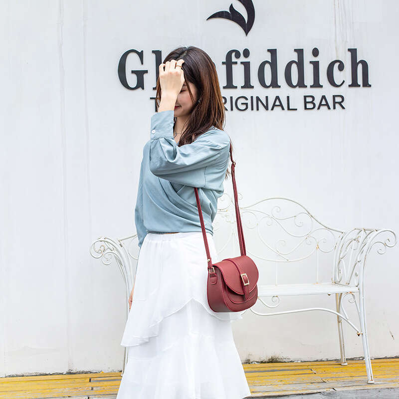 26 2025 Japanese and Korean New Fashionable Versatile Semi Shaped Saddle Belt Style Single Shoulder Diagonal Cross Women's Bag Trend