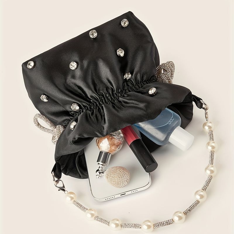 Elegant Solid Color Clutch With Rhie Accents And Pearl Handle