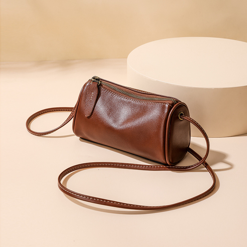 Designer 2025S genuine women spring new lightweight crossbody small oil wax soft cow leather feeling mini phone pillow bag